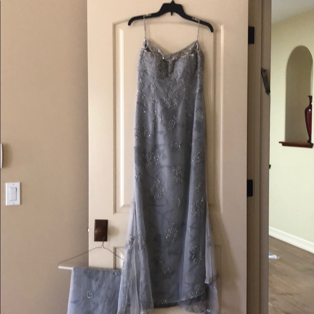 Clarie’s collection silver beaded gown